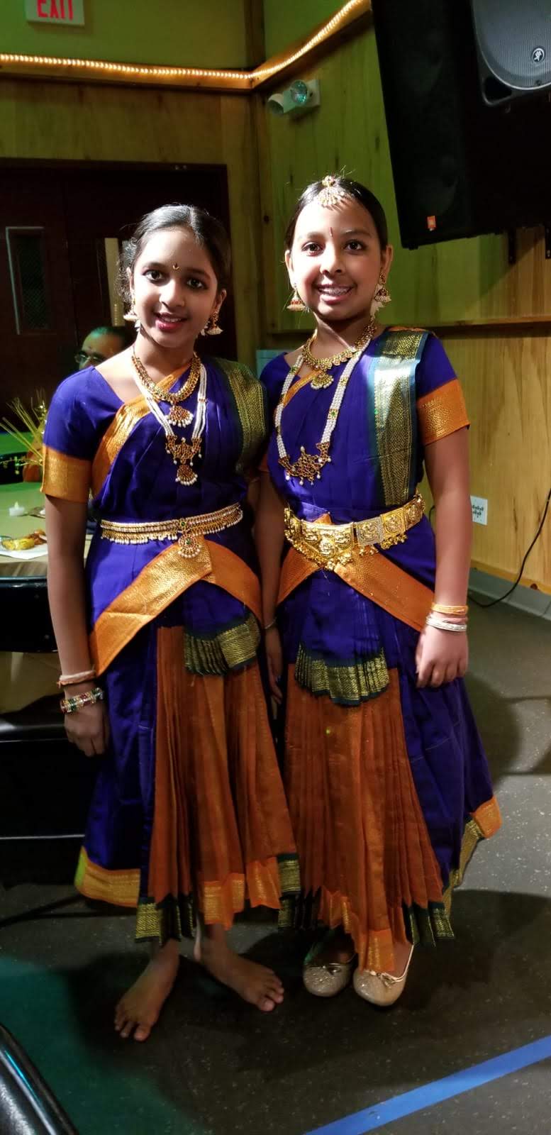 Shreya and Shriya on stage as children
