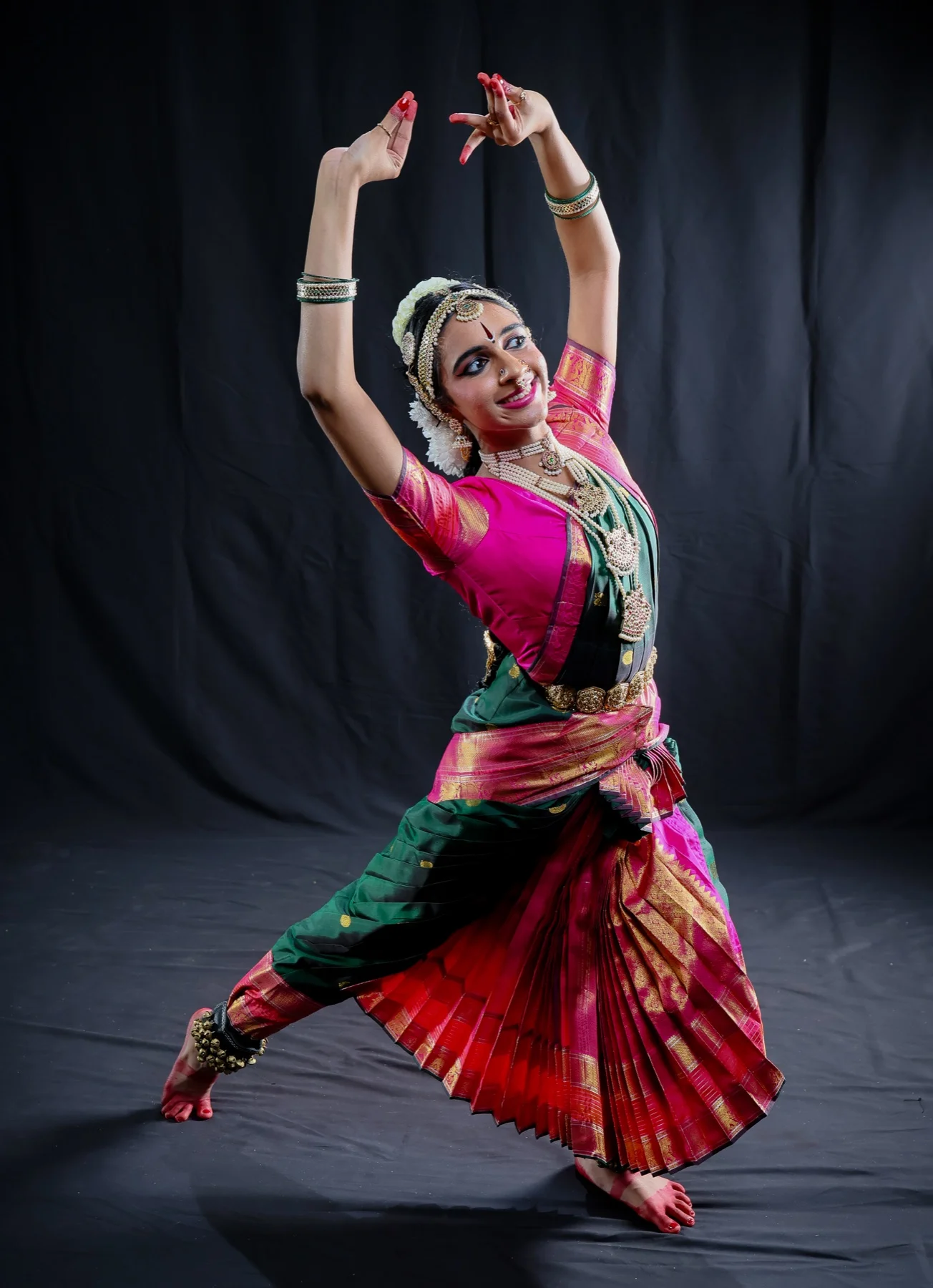 Shriya Natarajan in a dynamic Bharatanatyam pose